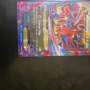 Binder full of 329 Pokémon and 58 energy cards